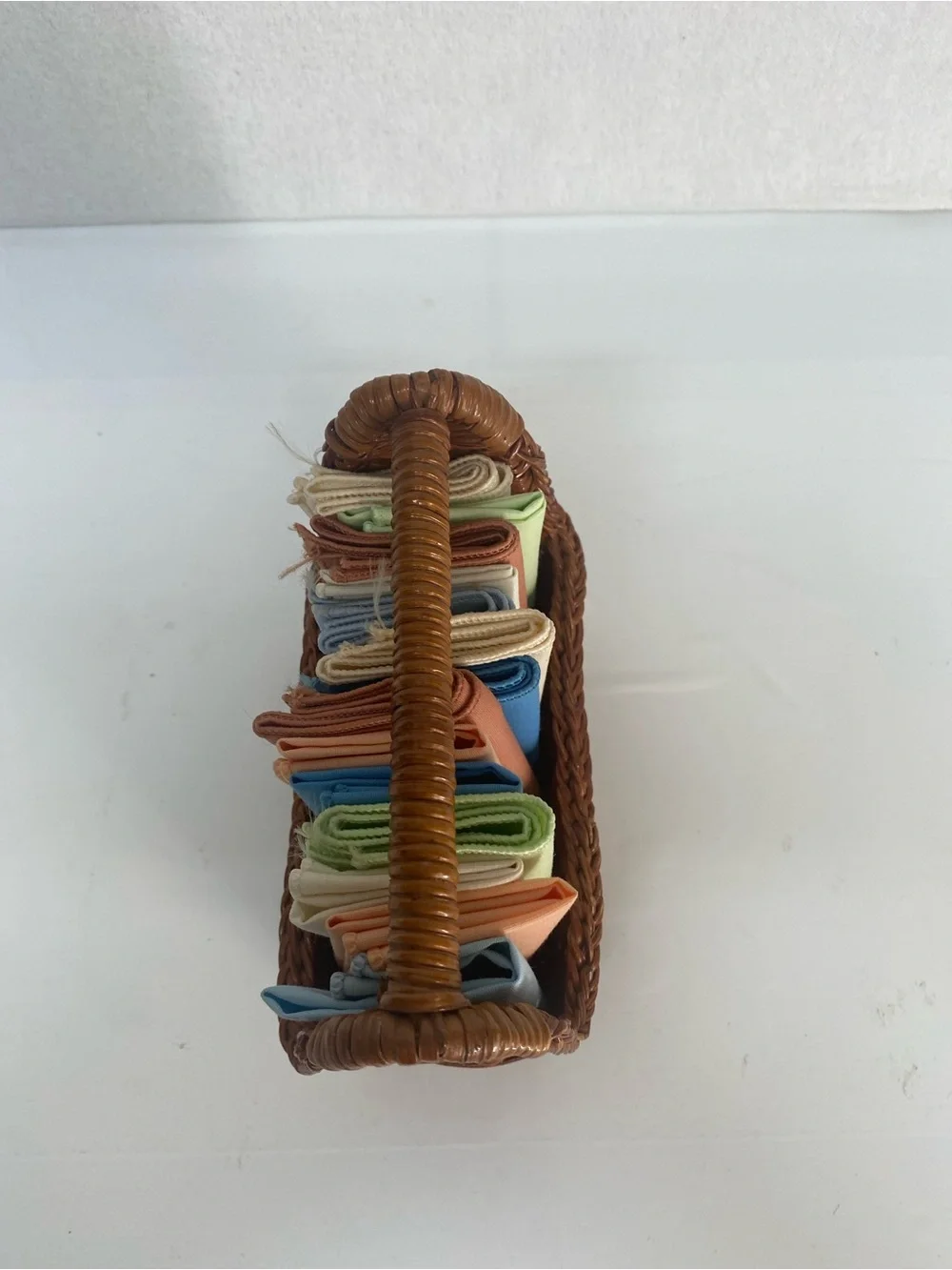 Wicker Basket Woven Rattan with Assorted Pastel Linens Cloths Storage Dainty